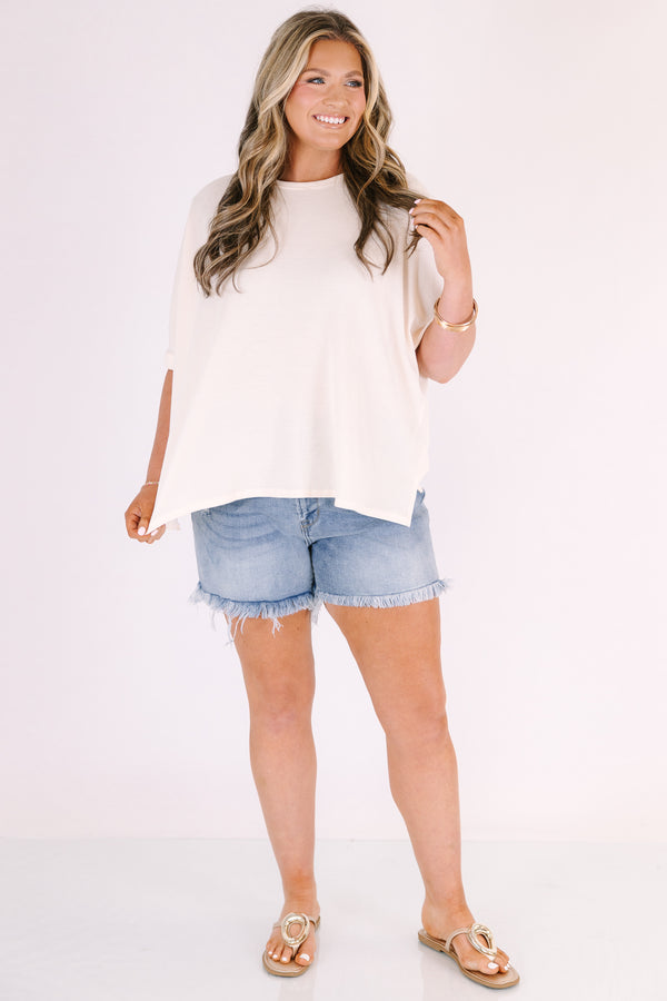 Chic Soul Plus Size Clothing, Light wash denim shorts with a distressed finish and frayed, raw-edge hems.