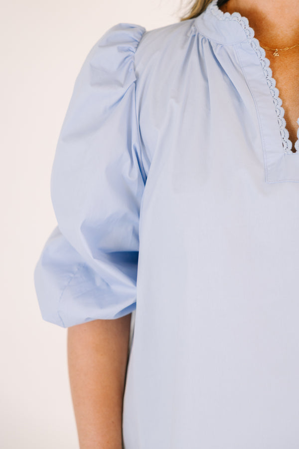 Chic Soul plus size clothing, light blue knee length dress with short bubble sleeves and a v-neckline that is outlined in a scalloped detail