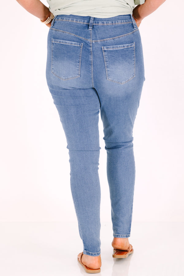 Chic Soul plus size clothing, medium wash skinny jeans with distressing at the knees