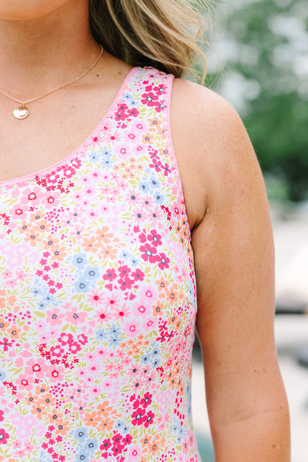 Chic Soul Plus Size Clothing, a primarily pink and white floral print one-piece swimsuit with one asymmetrical sleeve 
