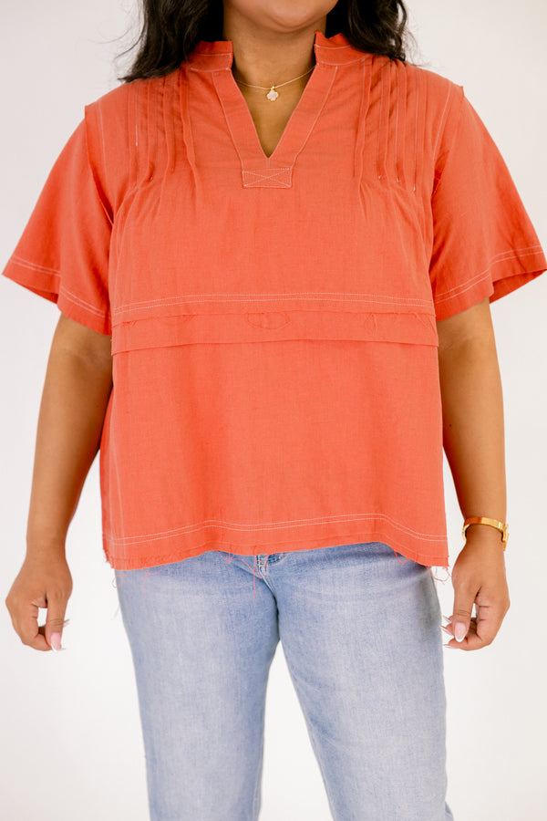 Chic Soul plus size clothing, brick red short sleeve v neck tiered structured top with white stitching detailing