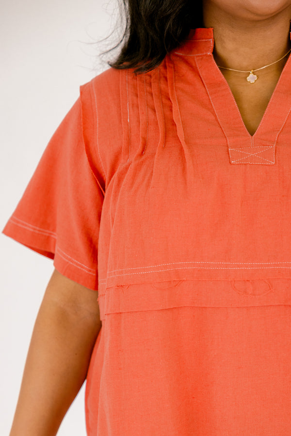 Chic Soul plus size clothing, brick red short sleeve v neck tiered structured top with white stitching detailing