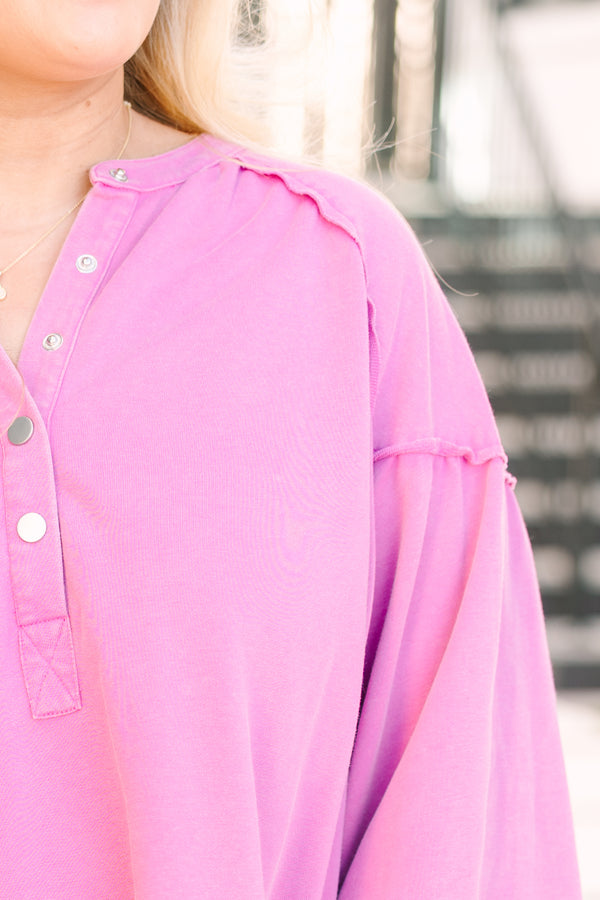 Chic Soul plus size clothing, purple pullover with long bubble sleeves buttons going down to the chest area and a distressed look on the sleeves and neckline 
