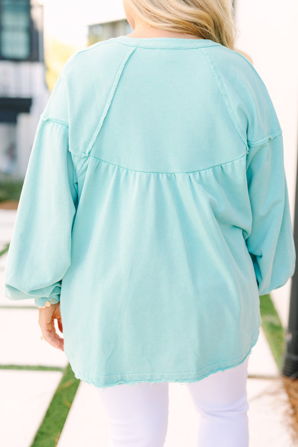 Chic Soul plus size clothing, light teal crewneck pullover with button opening at the neckline