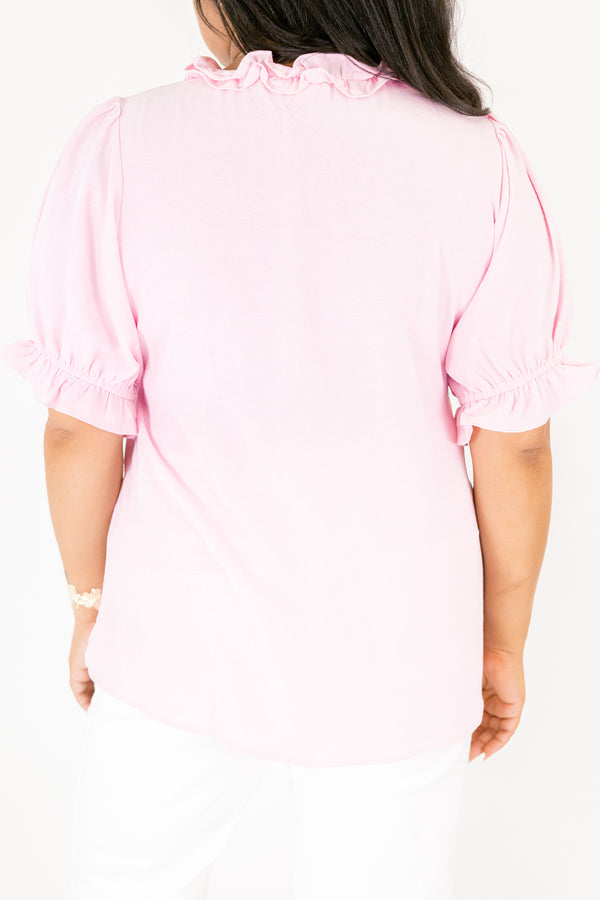Chic Soul plus size clothing, light pink top with bubble sleeves as well as a v-neckline and ruffle detailing going along the neckline under the bust and at the end of each sleeve 