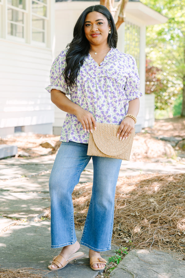 Plus Size purple floral print top with ruffled V-neckline and short puff sleeves.