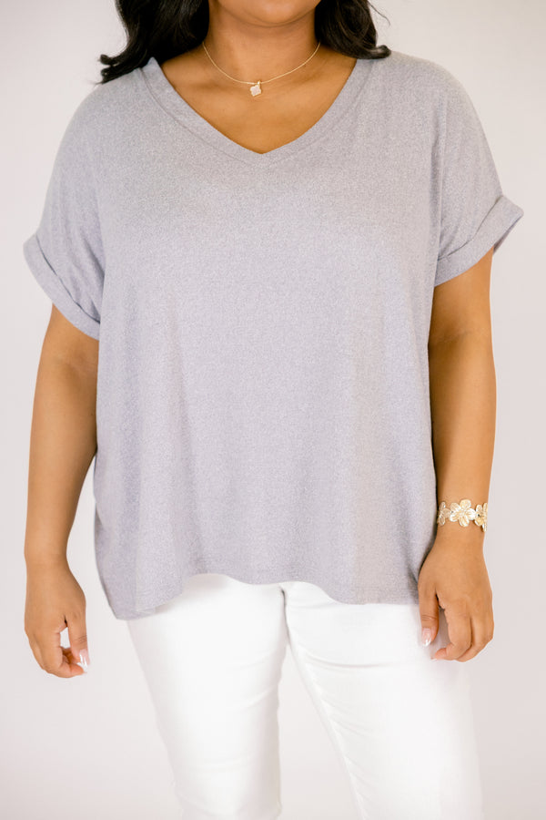 Heather grey colored tee with cuffed short sleeves and a scooped neck