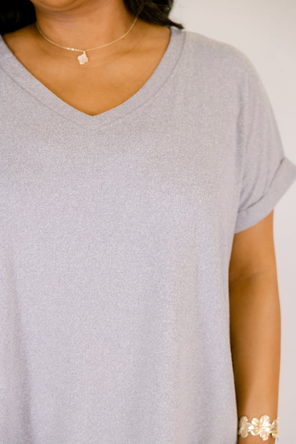Heather grey colored tee with cuffed short sleeves and a scooped neck