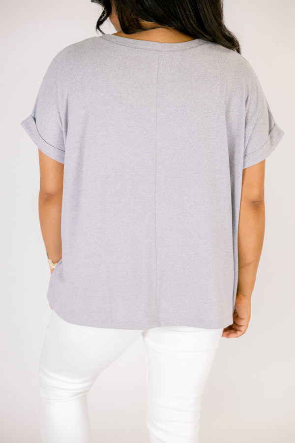 Heather grey colored tee with cuffed short sleeves and a scooped neck