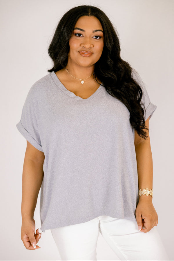 Heather grey colored tee with cuffed short sleeves and a scooped neck