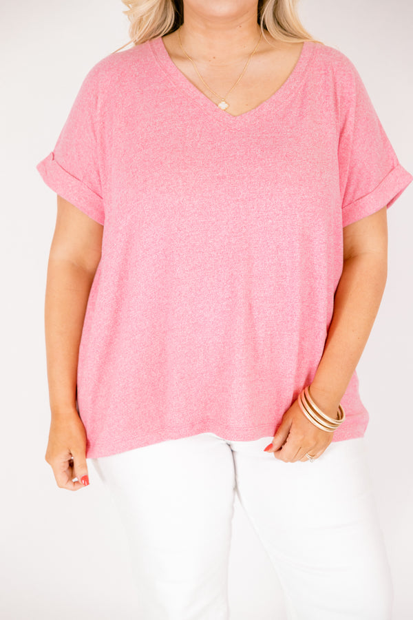 Heather fuchsia colored tee with cuffed short sleeves and a scooped neck