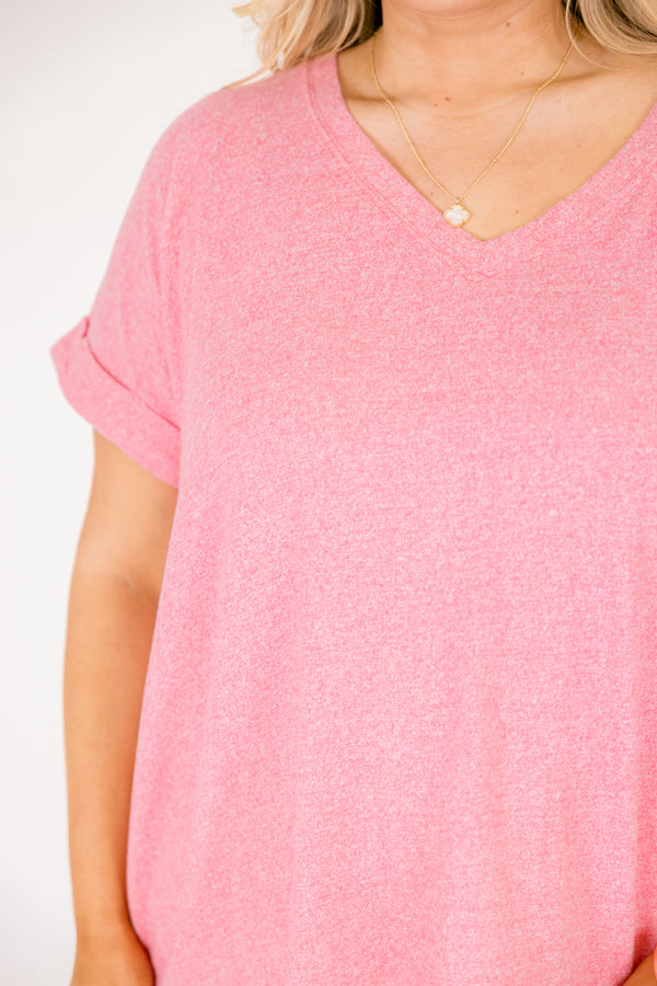 Heather fuchsia colored tee with cuffed short sleeves and a scooped neck