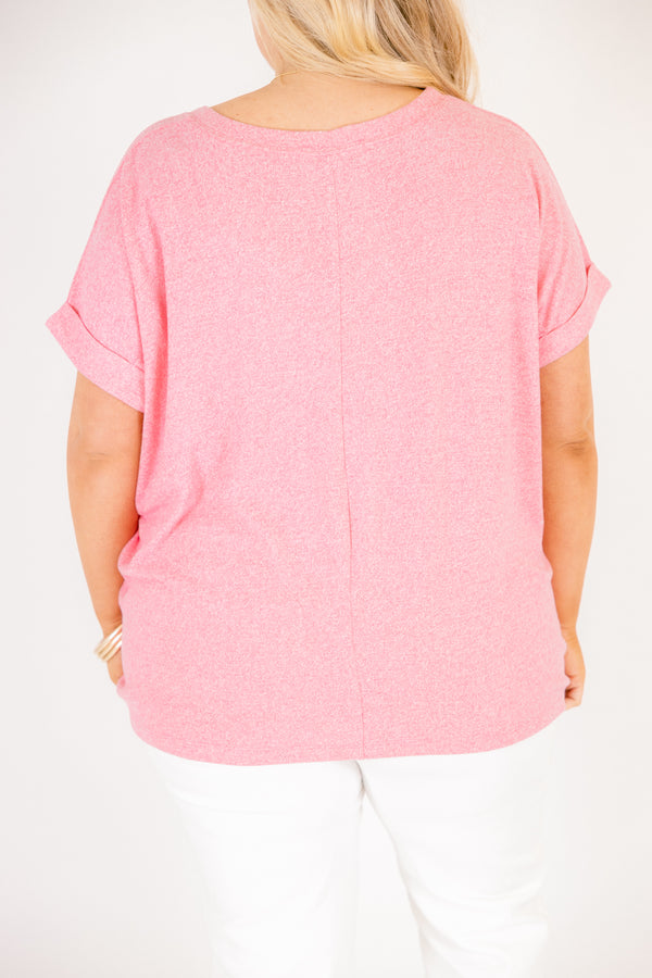 Heather fuchsia colored tee with cuffed short sleeves and a scooped neck