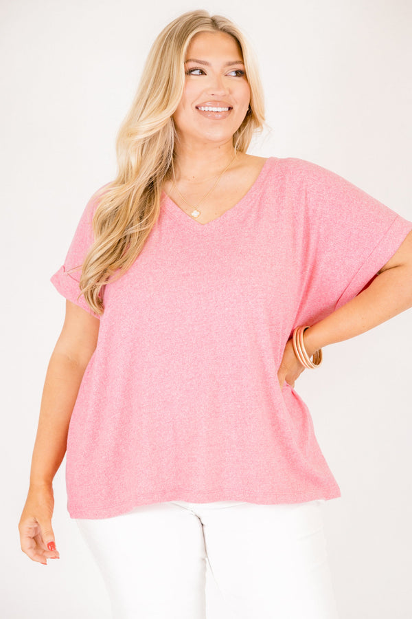 Heather fuchsia colored tee with cuffed short sleeves and a scooped neck