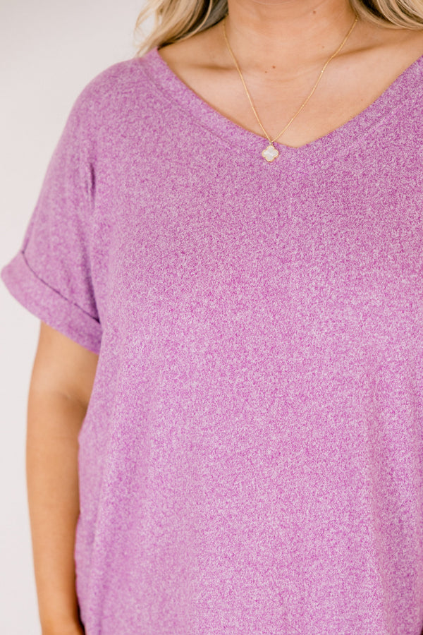 Heather light plum colored tee with cuffed short sleeves and a scooped neck