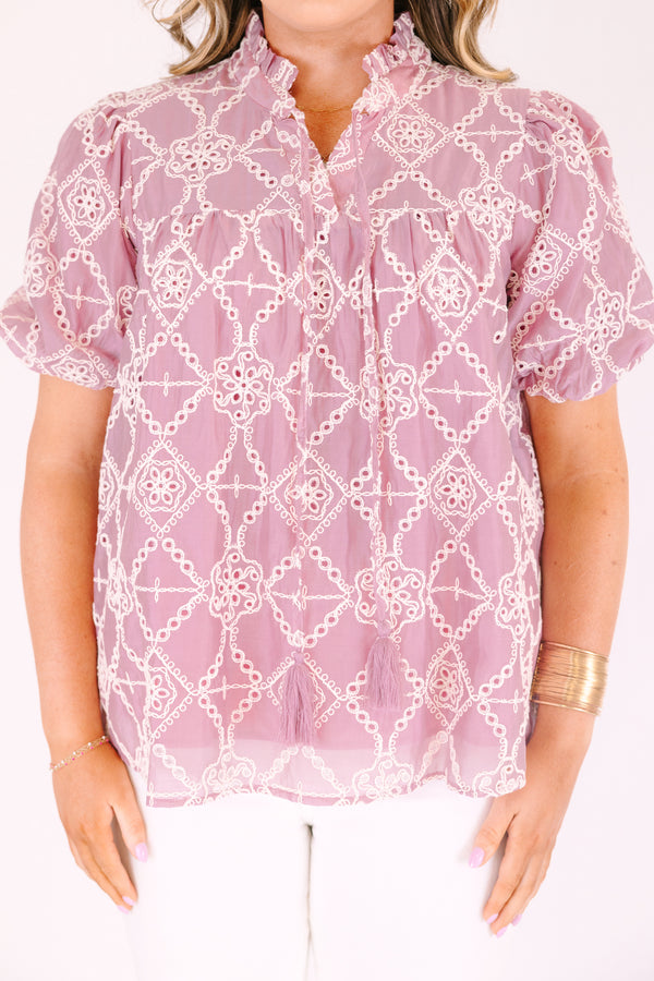 Chic Soul plus size clothing, mauve  short-sleeve blouse with a relaxed, flowy fit, featuring eyelet geometric patterns and a ruffled split neckline with tie tassels