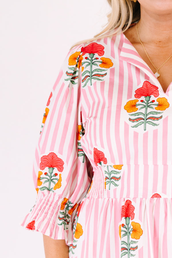 Chic Soul plus size clothing, orange striped maxi dress with half sleeves that have a ruffle flare out on the ends as well as a slight v-neckline and a floral block pattern throughout 