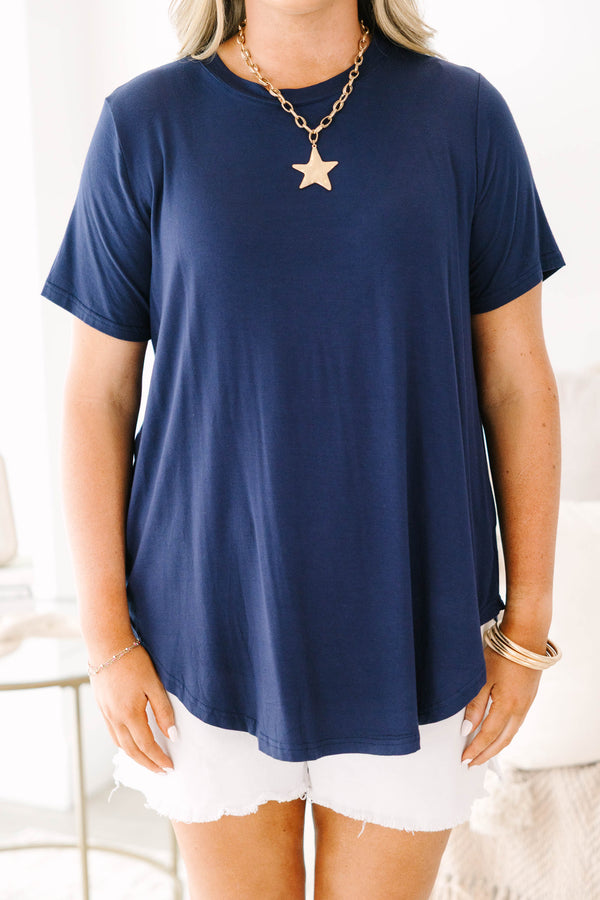 Short-sleeve navy blue crewneck tunic top with a relaxed fit and side splits.