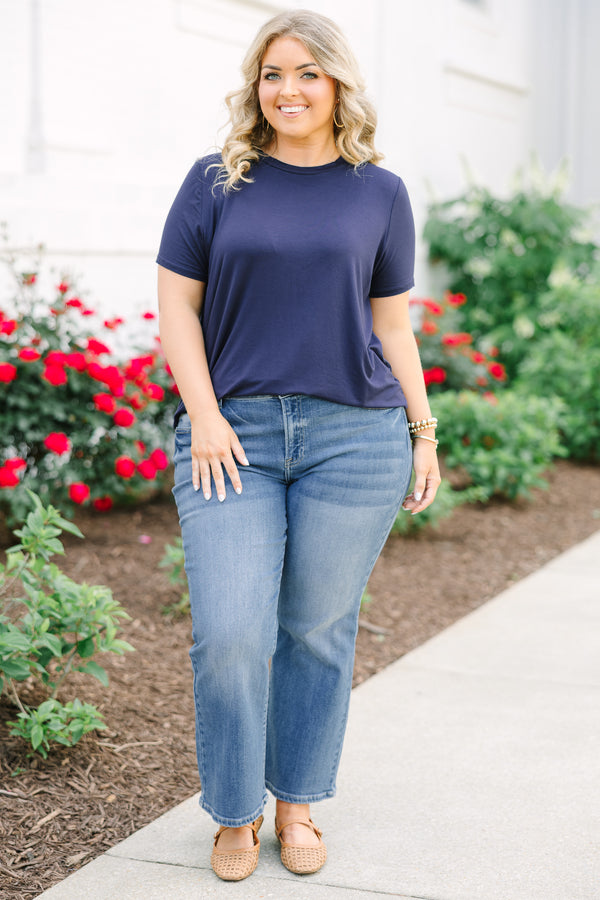 Short-sleeve navy blue crewneck tunic top with side splits and a relaxed fit.
