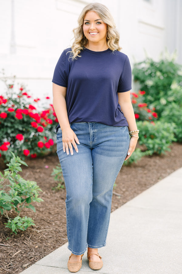 A solid navy short-sleeve tunic top with a crew neckline and side splits.