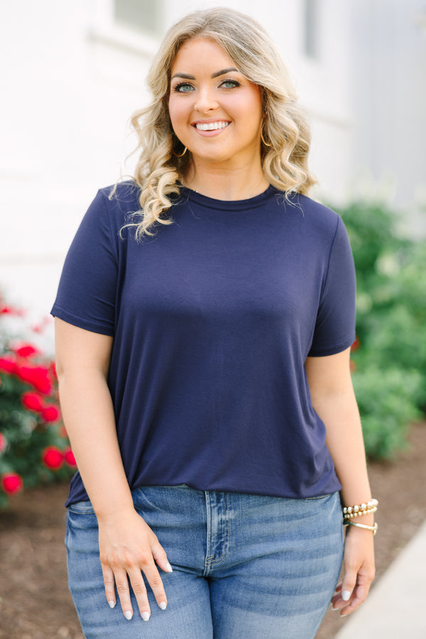 Short-sleeve navy blue crewneck tunic top with a relaxed fit and side splits.