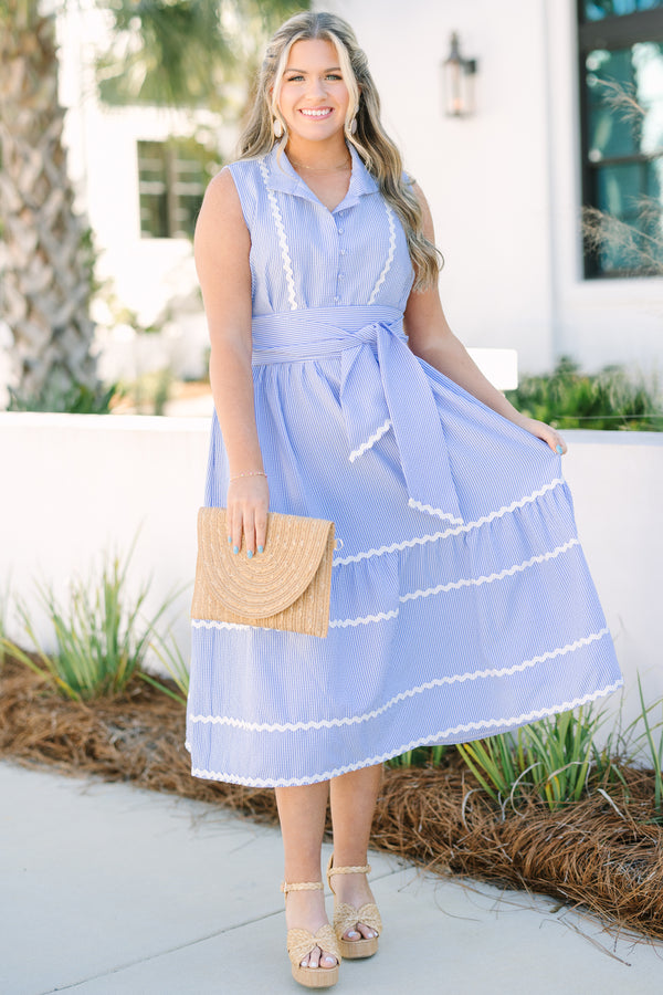 Chic Soul plus size clothing, blue sleeveless midi dress with collar, button down front, waist tie and white ricrac trim along the bottom of the dress and waist tie