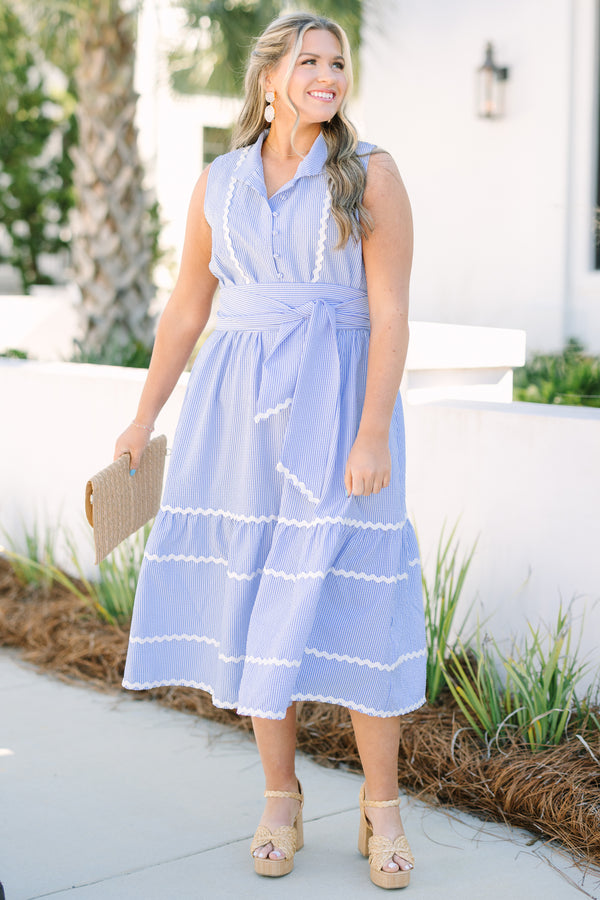 Chic Soul plus size clothing, blue sleeveless midi dress with collar, button down front, waist tie and white ricrac trim along the bottom of the dress and waist tie