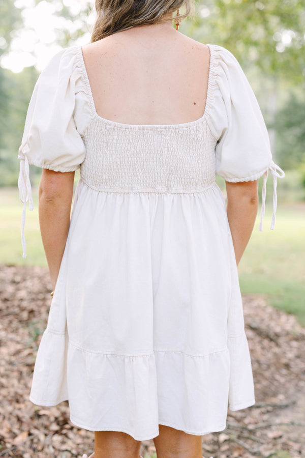Plus Size cream denim mini dress with puff sleeves, a square neckline, and a tiered skirt.