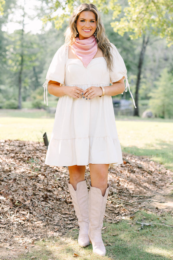 Plus Size cream denim mini dress with puff sleeves, a square neckline, and a tiered skirt.