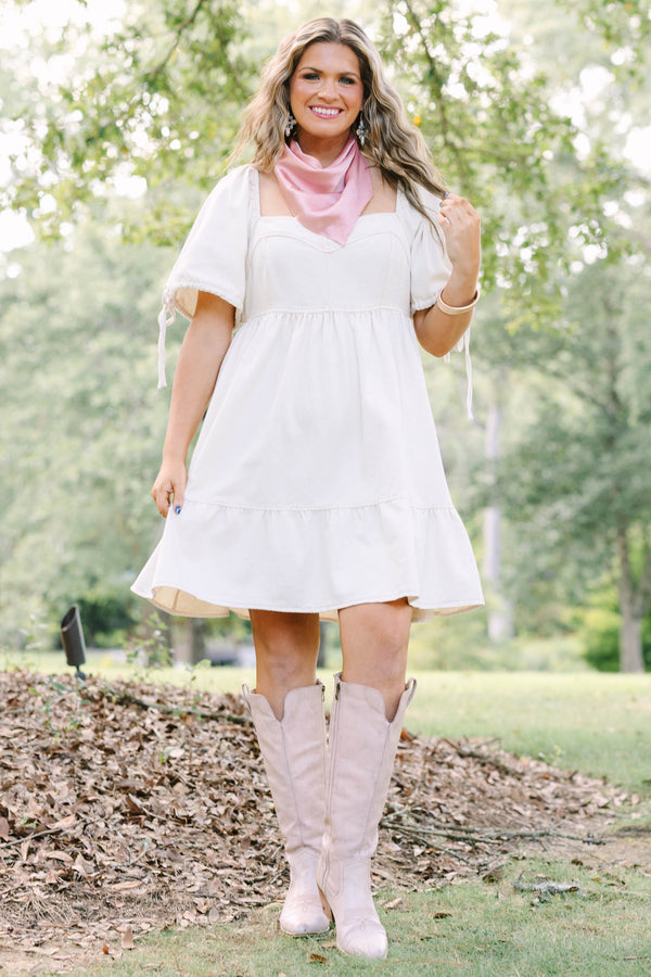 Plus Size cream denim mini dress with puff sleeves, a square neckline, and a tiered skirt.
