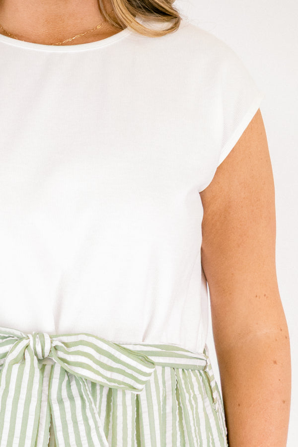Chic Soul plus size clothing, maxi dress with a solid white short sleeve top and then a green striped skirt starting at the waist and going all the way down as well as a bow that ties around the waist 