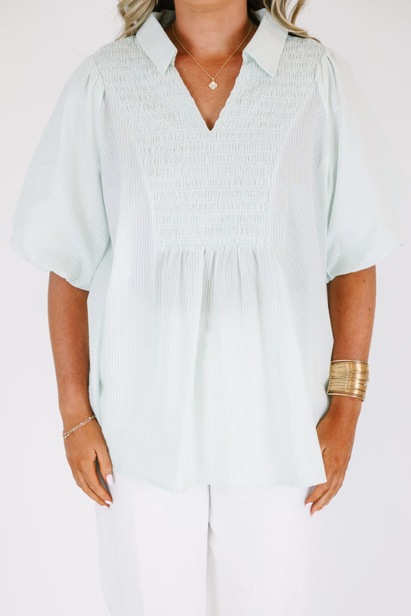 Plus Size green and white striped short puff sleeve top with a smocked bust and collar.