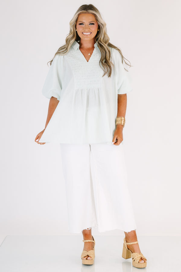Plus Size green and white striped short puff sleeve top with a smocked bust and collar.
