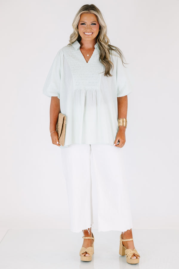 Plus Size green and white striped short puff sleeve top with a smocked bust and collar.