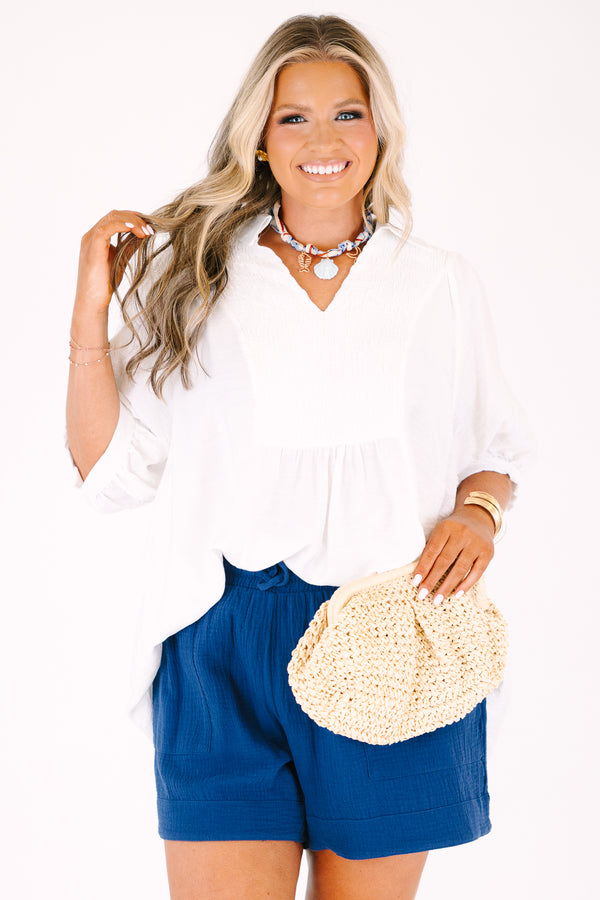 Chic Soul plus size clothing, white top with bubble sleeves and smocked detailing on the chest area and along the v-neckline 