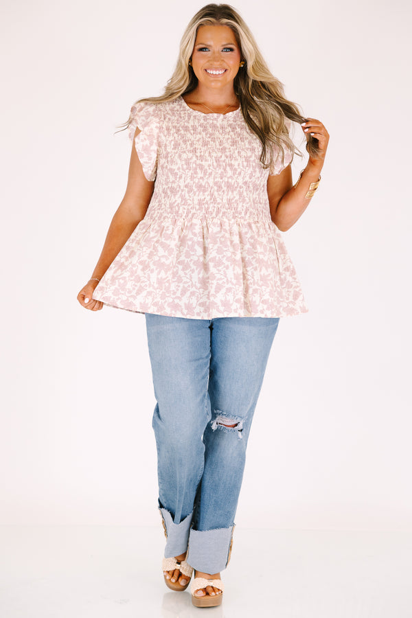 Chic Soul plus size clothing, a wide leg jean in a medium wash featuring thick cuffed bottom hems and a rip on one knee 