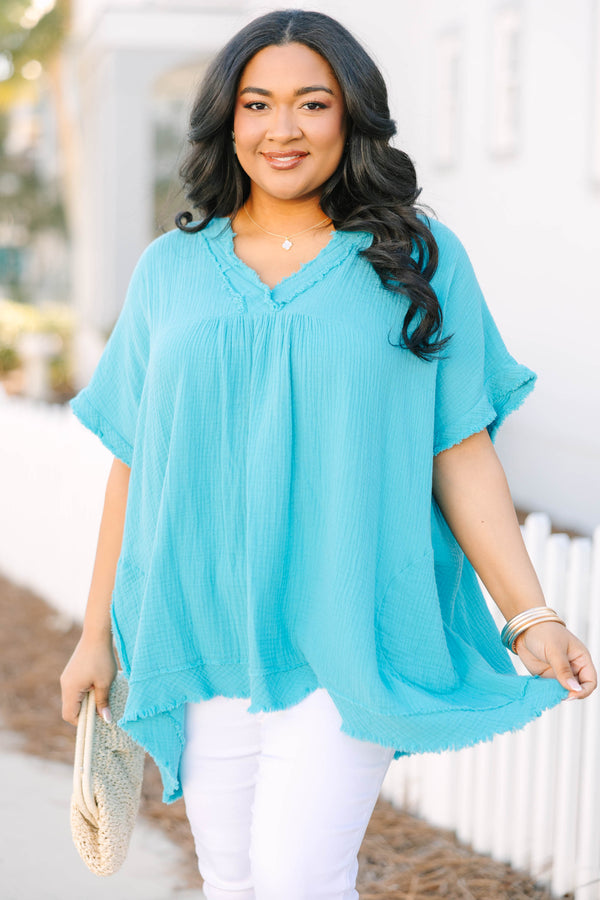 Chic Soul plus size clothing, teal short sleeve gauze material top with v-neckline and raw hem distressing along the bottom, sleeves, and neckline