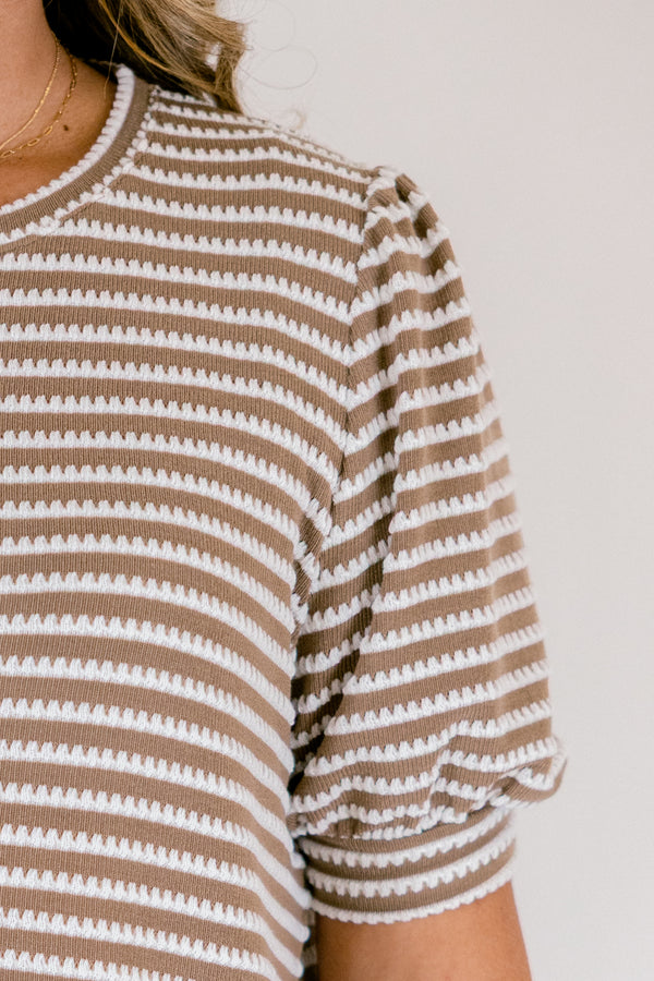 Chic Soul plus size clothing, brown top with a white striped pattern and bubble sleeves that have a cuff at the end 