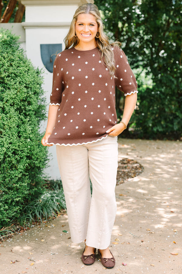 Plus Size brown short sleeve sweater with white polka dots and scalloped white trim.