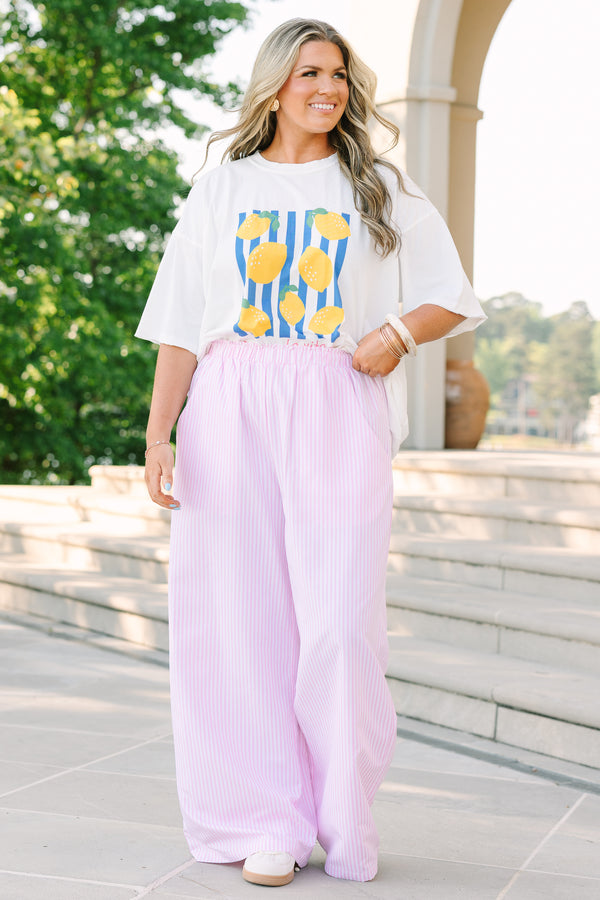 Plus Size pink and white vertical striped wide-leg pants with an elastic waistband and pockets.