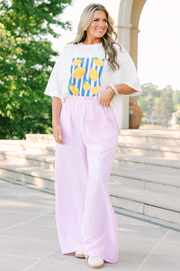 Plus Size pink and white vertical striped wide-leg pants with an elastic waistband and pockets.
