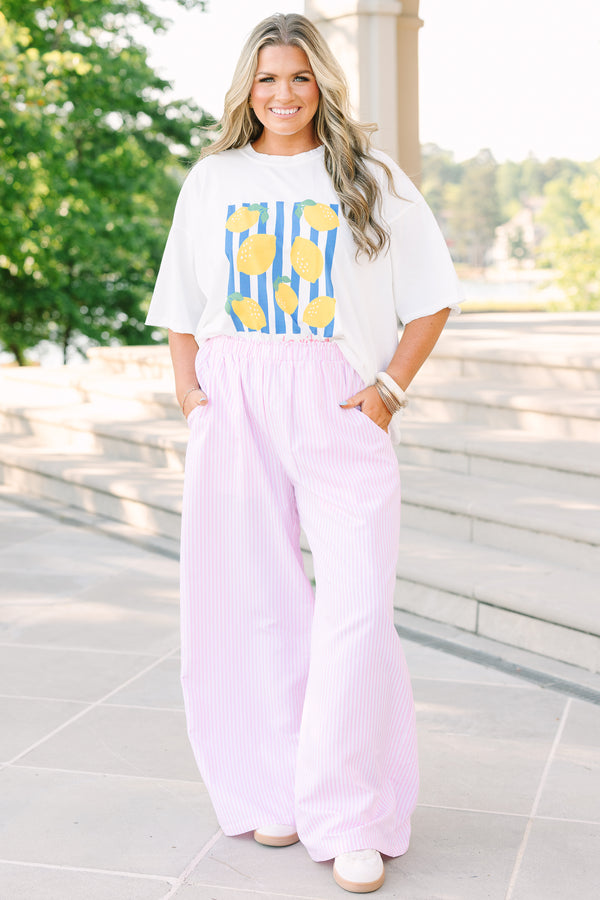 Plus Size pink and white vertical striped wide-leg pants with an elastic waistband and pockets.