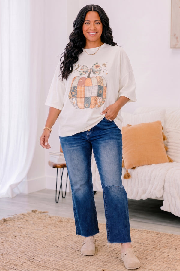 Chic Soul plus size clothing, ivory short sleeve boyfriend tee with patchwork pumpkin in the middle and a bow on the stem