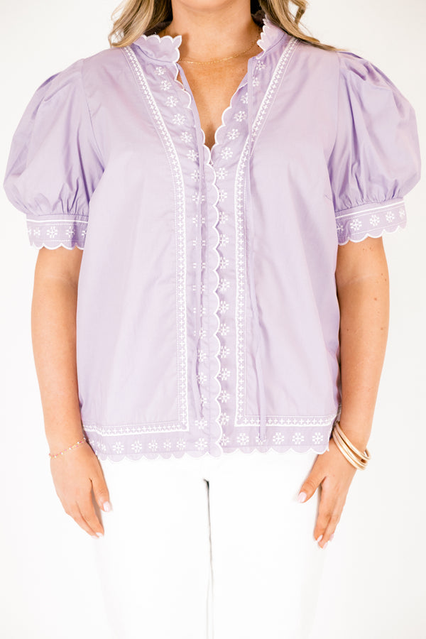 Chic Soul plus size clothing, lavender top with white stitched circle pattern on the bottom of the sleeves outlining the v-neckline going down the center of the shirt and going along the bottom of the shirt as well as bubble sleeves that have a scalloped cuff on the bottom of each sleeve 