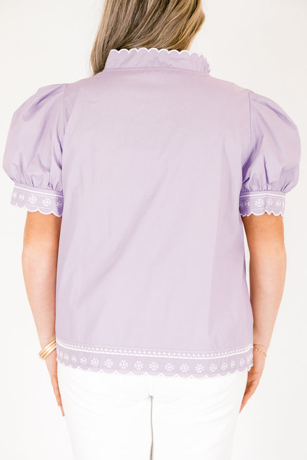 Chic Soul plus size clothing, lavender top with white stitched circle pattern on the bottom of the sleeves outlining the v-neckline going down the center of the shirt and going along the bottom of the shirt as well as bubble sleeves that have a scalloped cuff on the bottom of each sleeve 