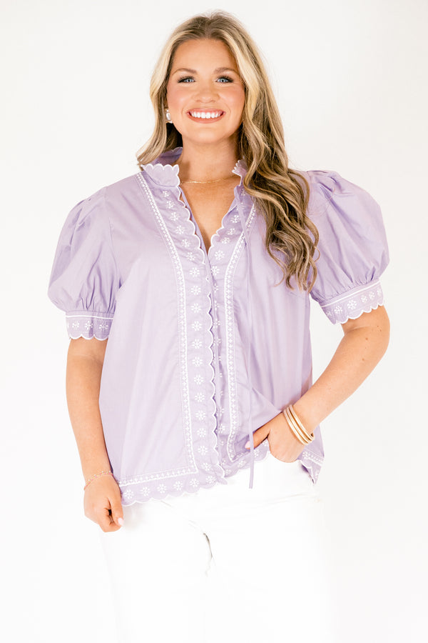 Chic Soul plus size clothing, lavender top with white stitched circle pattern on the bottom of the sleeves outlining the v-neckline going down the center of the shirt and going along the bottom of the shirt as well as bubble sleeves that have a scalloped cuff on the bottom of each sleeve 