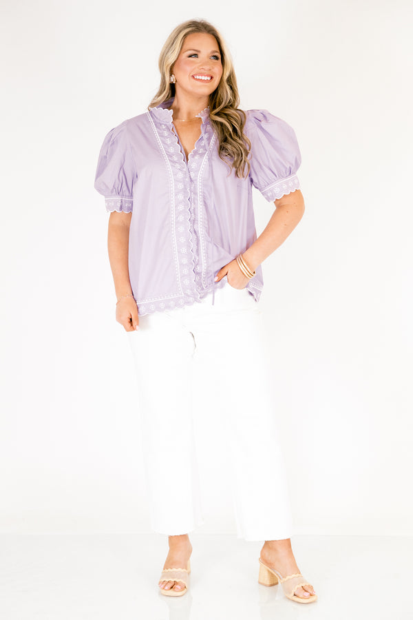 Chic Soul plus size clothing, lavender top with white stitched circle pattern on the bottom of the sleeves outlining the v-neckline going down the center of the shirt and going along the bottom of the shirt as well as bubble sleeves that have a scalloped cuff on the bottom of each sleeve 