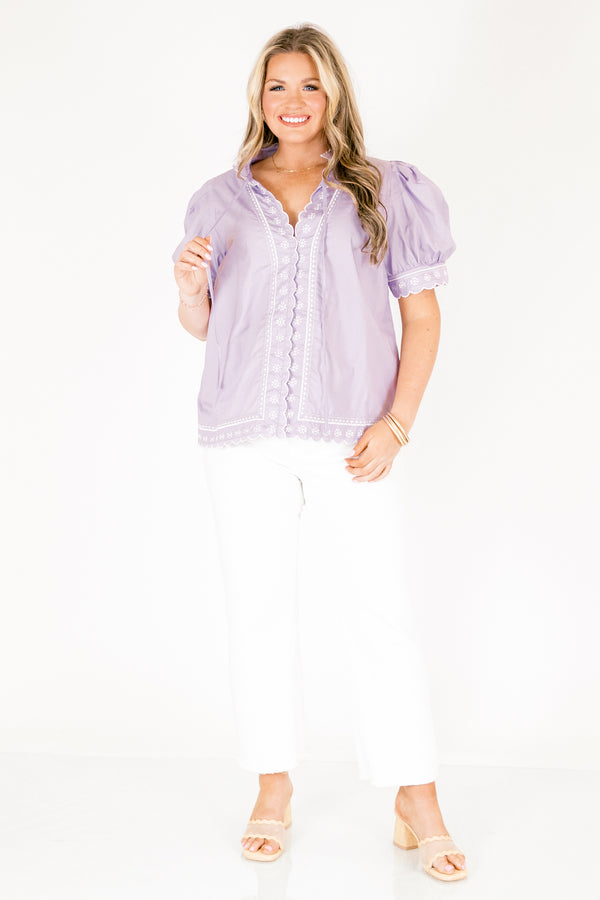 Chic Soul plus size clothing, lavender top with white stitched circle pattern on the bottom of the sleeves outlining the v-neckline going down the center of the shirt and going along the bottom of the shirt as well as bubble sleeves that have a scalloped cuff on the bottom of each sleeve 