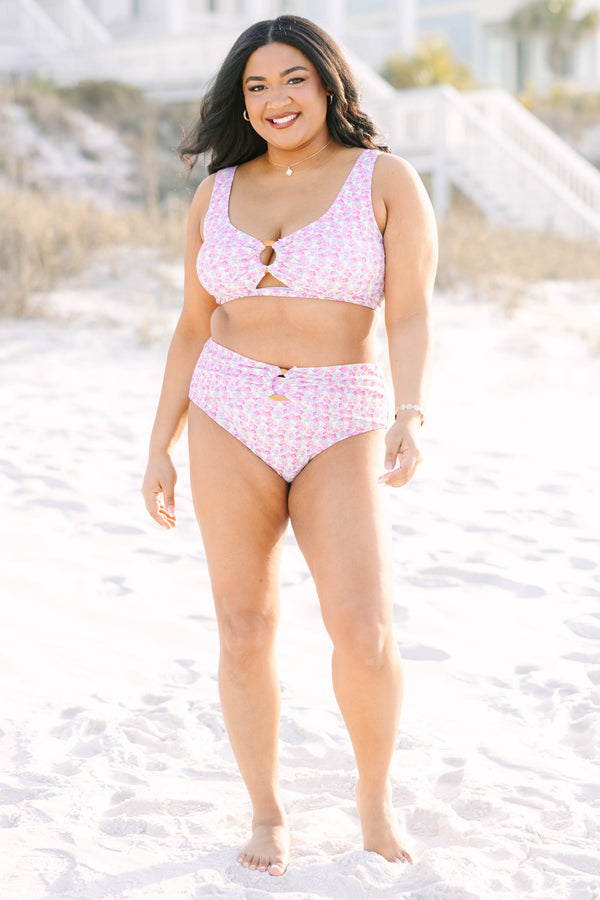 Chic soul plus size clothing, high waisted pink floral swim bottoms with am overlay that goes across that top of the bottom that has a woven circle belt detail in the middle of the bottom 