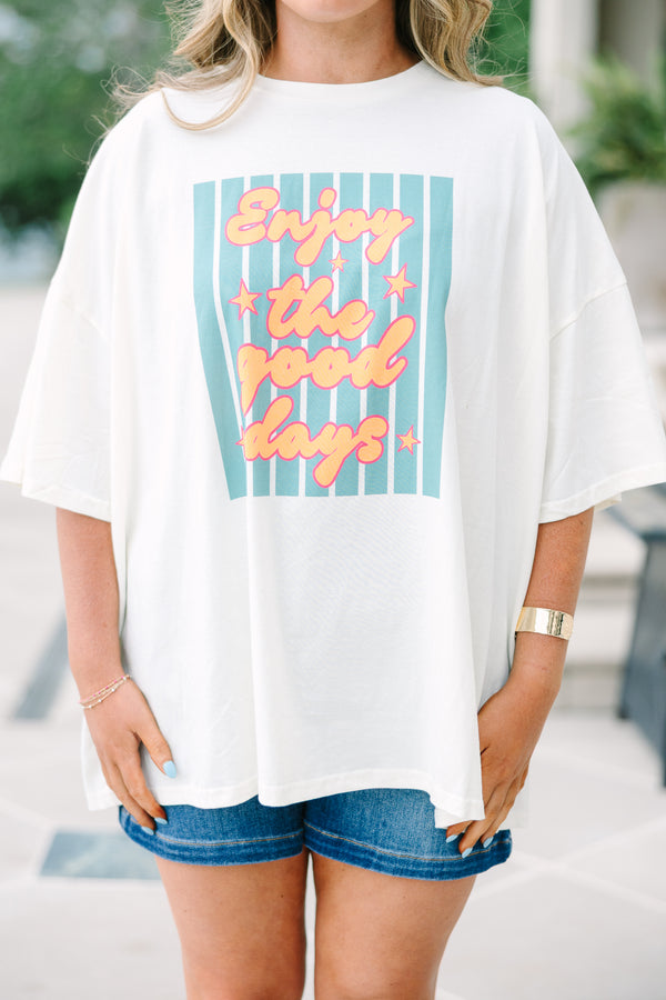 Chic Soul Plus Size Clothing, Oversized ivory boyfriend tee with a colorful Enjoy the Good graphic and relaxed short sleeves.